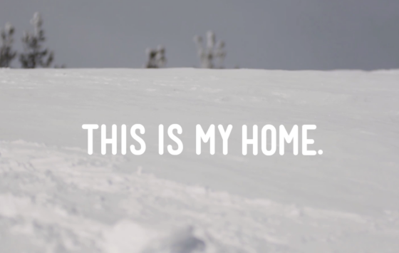 text "this is my home." background is a snowy ground with a dull sky.